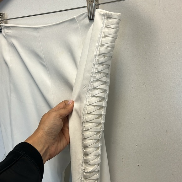 JONATHAN SIMKHAI Lace-up Cropped Crepe Flared Pants In Ivory - Picture 7 of 9